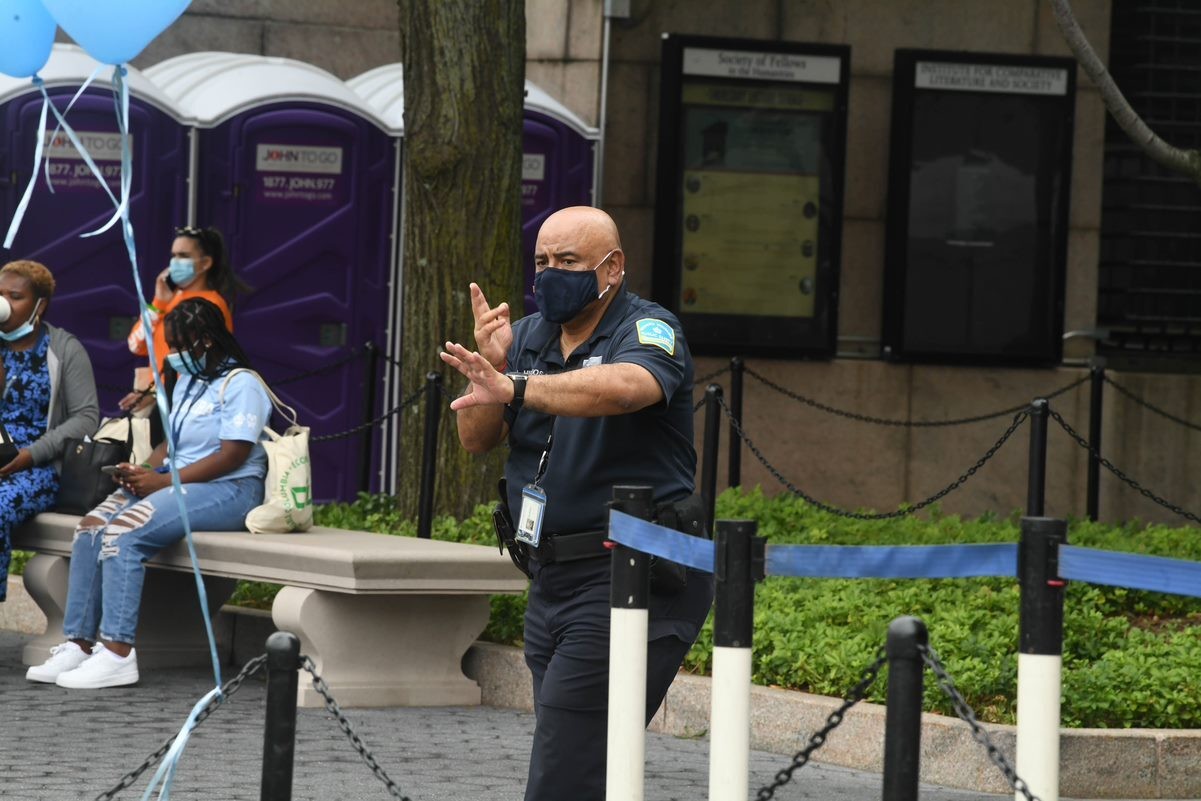 During special events, Public Safety provides the appropriate level of security coverage for university events and helps to direct traffic on campus. Public Safety Officer in uniform directing traffic on campus.