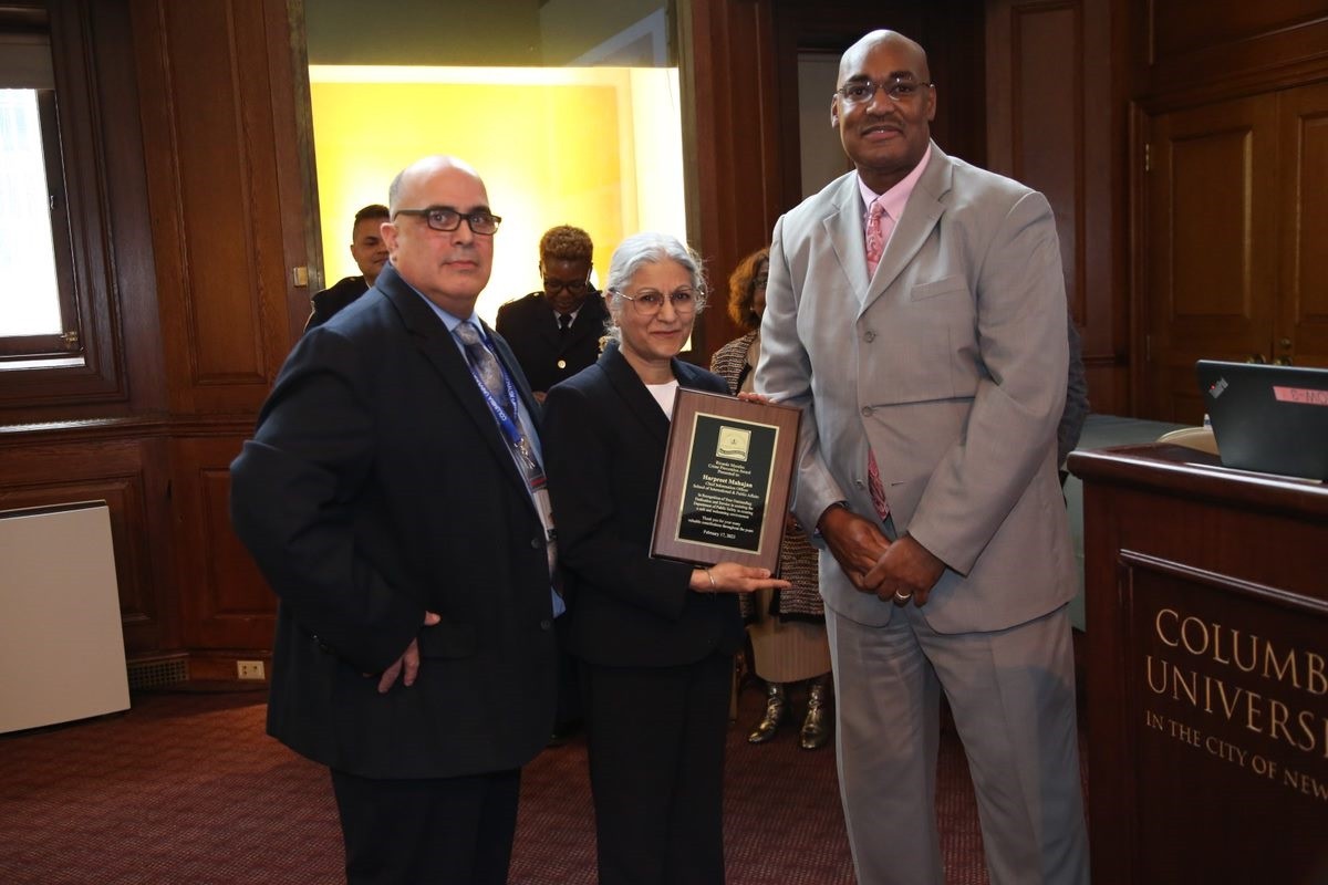 Harpreet Mahajan, chief information officer at the School of International and Public Affairs received The Ricardo Morales Crime Prevention Award for her dedication and partnership in helping the Department of Public Safety create awareness on campus and in the community. Ricardo Morales, Harpreet Mahajan, and Gerald Lewis Jr. pose for a photo