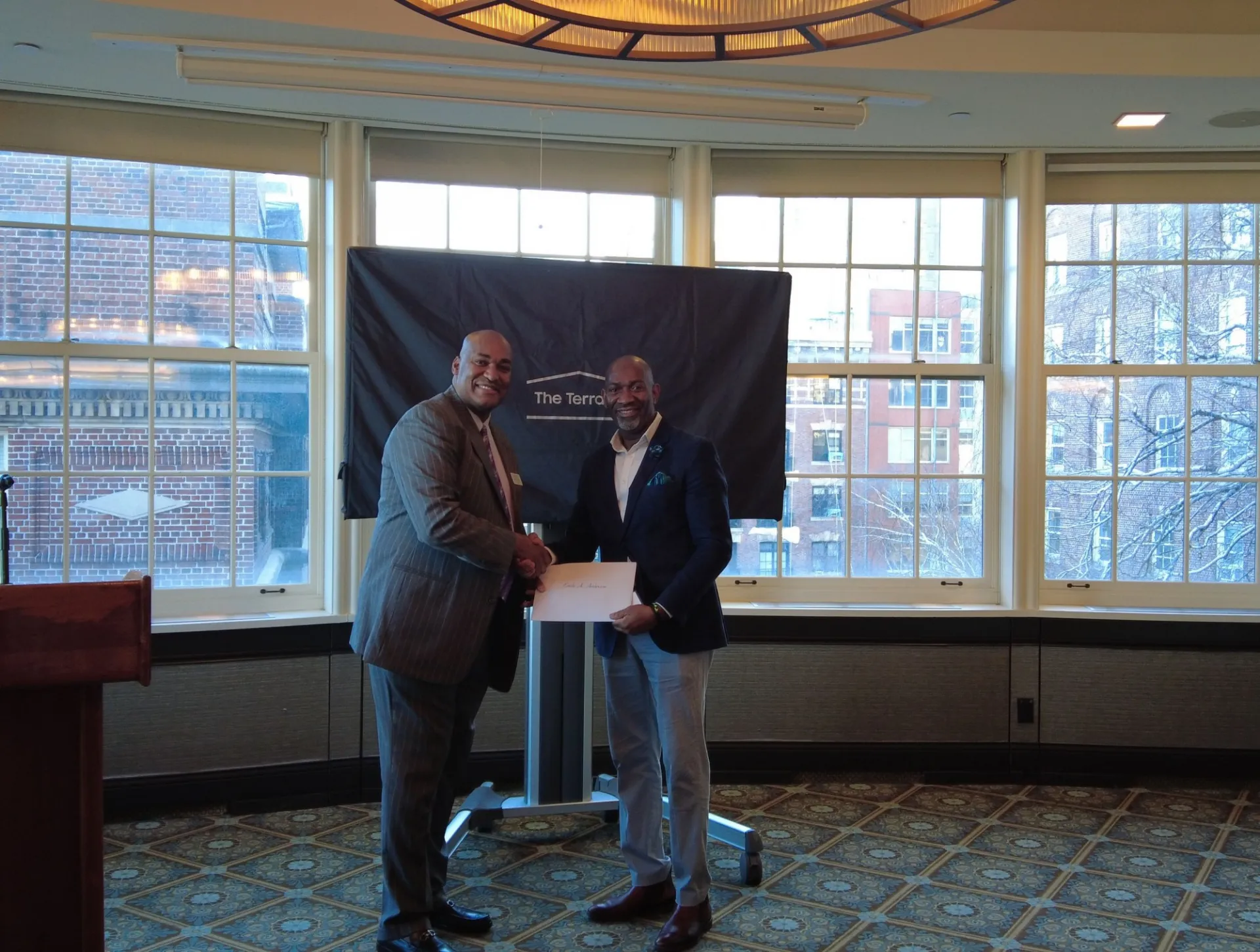 VP of Public Safety Gerald Lewis and Emile Anderson pose for a photo