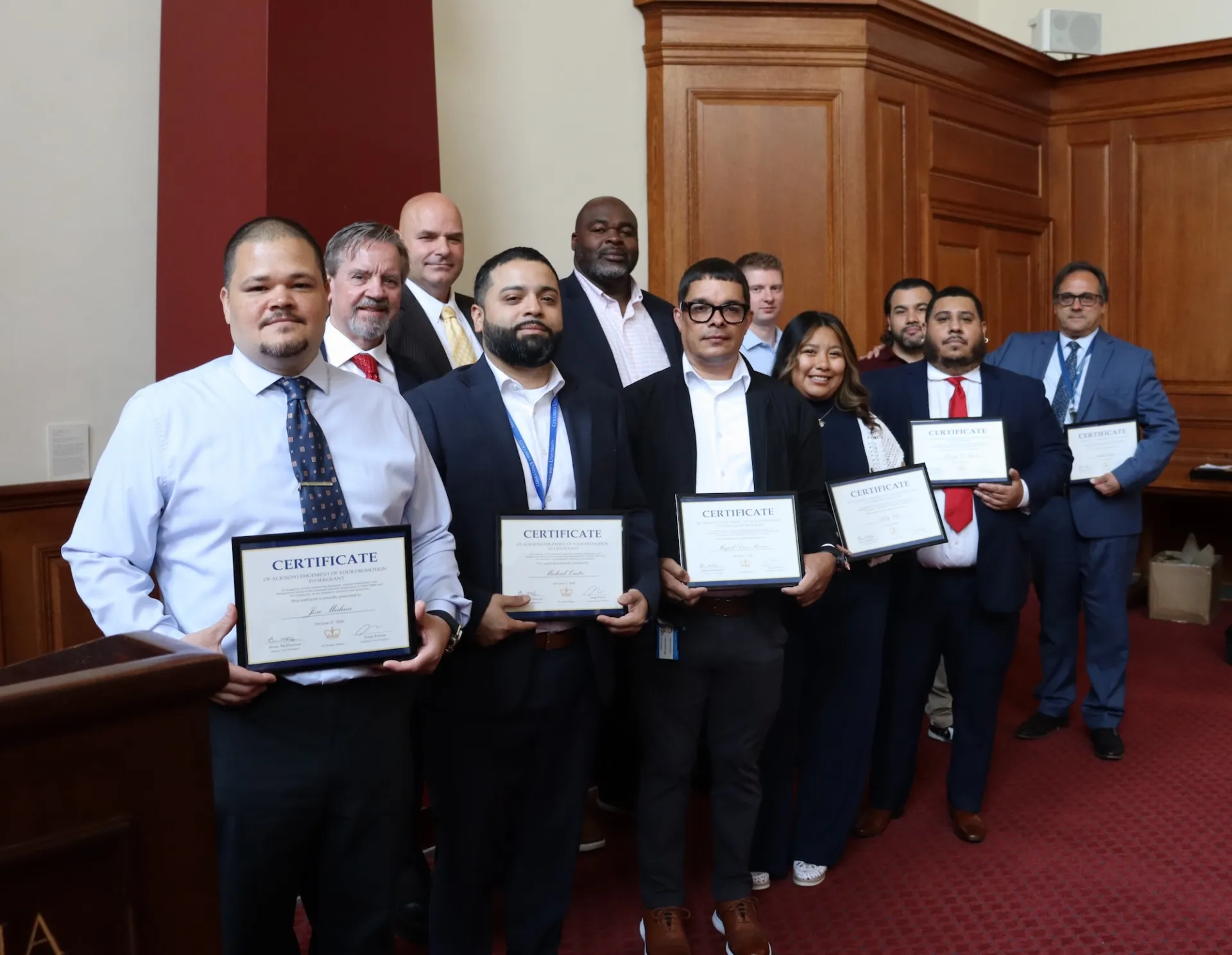 Group of people holds certificates